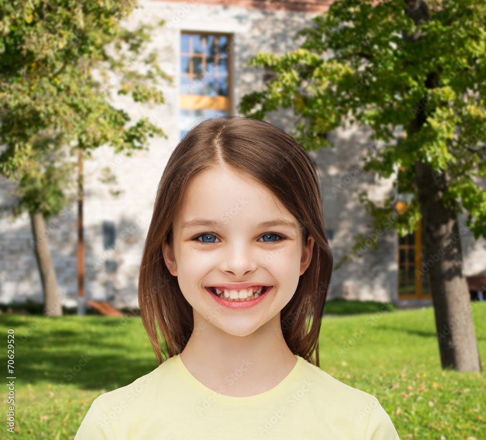 Canvas Prints smiling little girl over white background