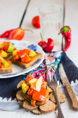 grilled rye toast with pepper, tomato, zucchini