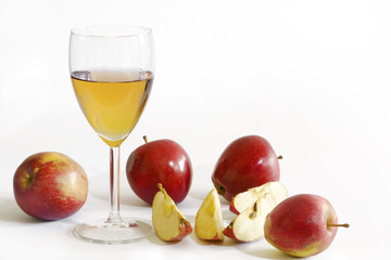 apple juice and red apples, white background