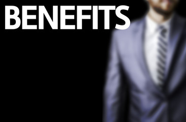 Benefits written on a board