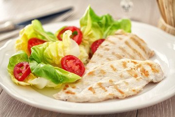 Grilled chicken with salad