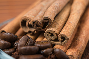 Close up of  cinnamon and coffee heap.