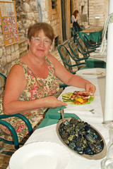 Lunch in a fish restaurant on the street in Dubrovnik