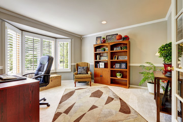 Spacious office room interior with flowers