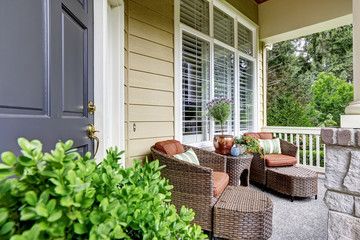 Entrance porch with wicker patio set
