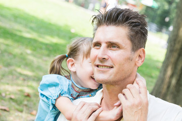 Fototapeta premium Father and Daughter Playing Together at Park