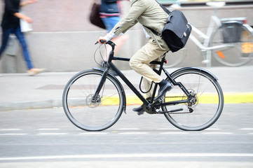 Fototapeta na wymiar Man on bike in profile