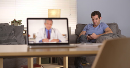 Doctor giving advice via webcam