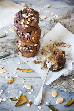 homemade muffins with pumpkin, chocolate and flakes