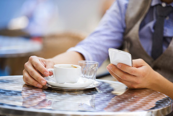 Hipster businessman in cafe