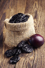 Prunes with plums in small sack