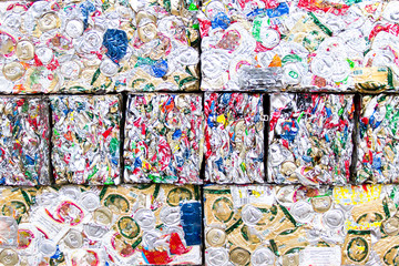 Small bales of compacted cans for recycling