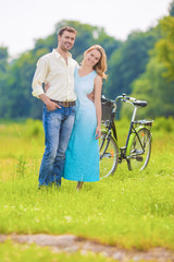 Fototapeta na wymiar Happy and Smiling Young Caucasian Couple Having Romantic Time To