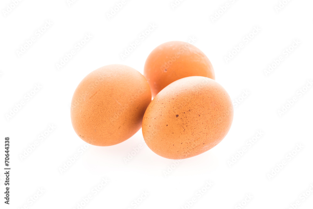 Wall mural Eggs isolated on white background