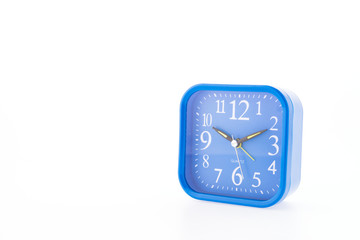 Blue clock isolated on white background