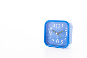Blue clock isolated on white background