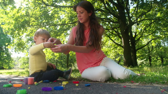Woman and Toddler Using Play Dough