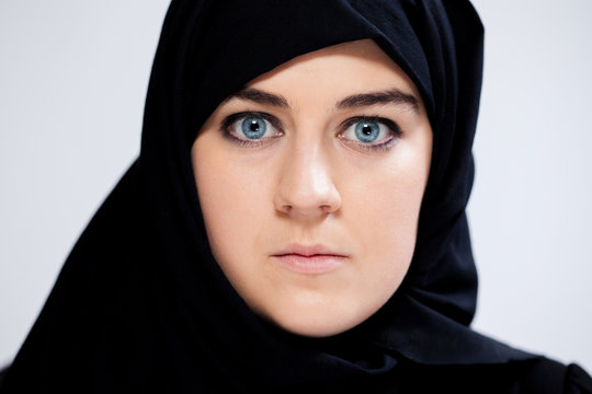 Close-up of scared muslim woman