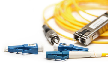 Optic fiber with connector isolated on white