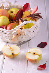 Naklejka na ściany i meble Fresh ripe apples in basket