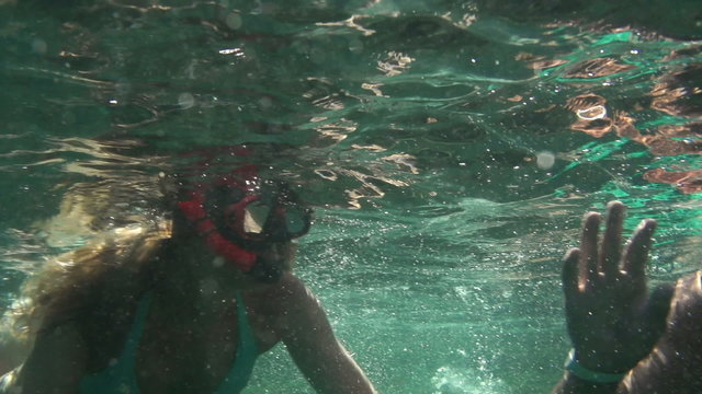 Couple snorkeling on holiday