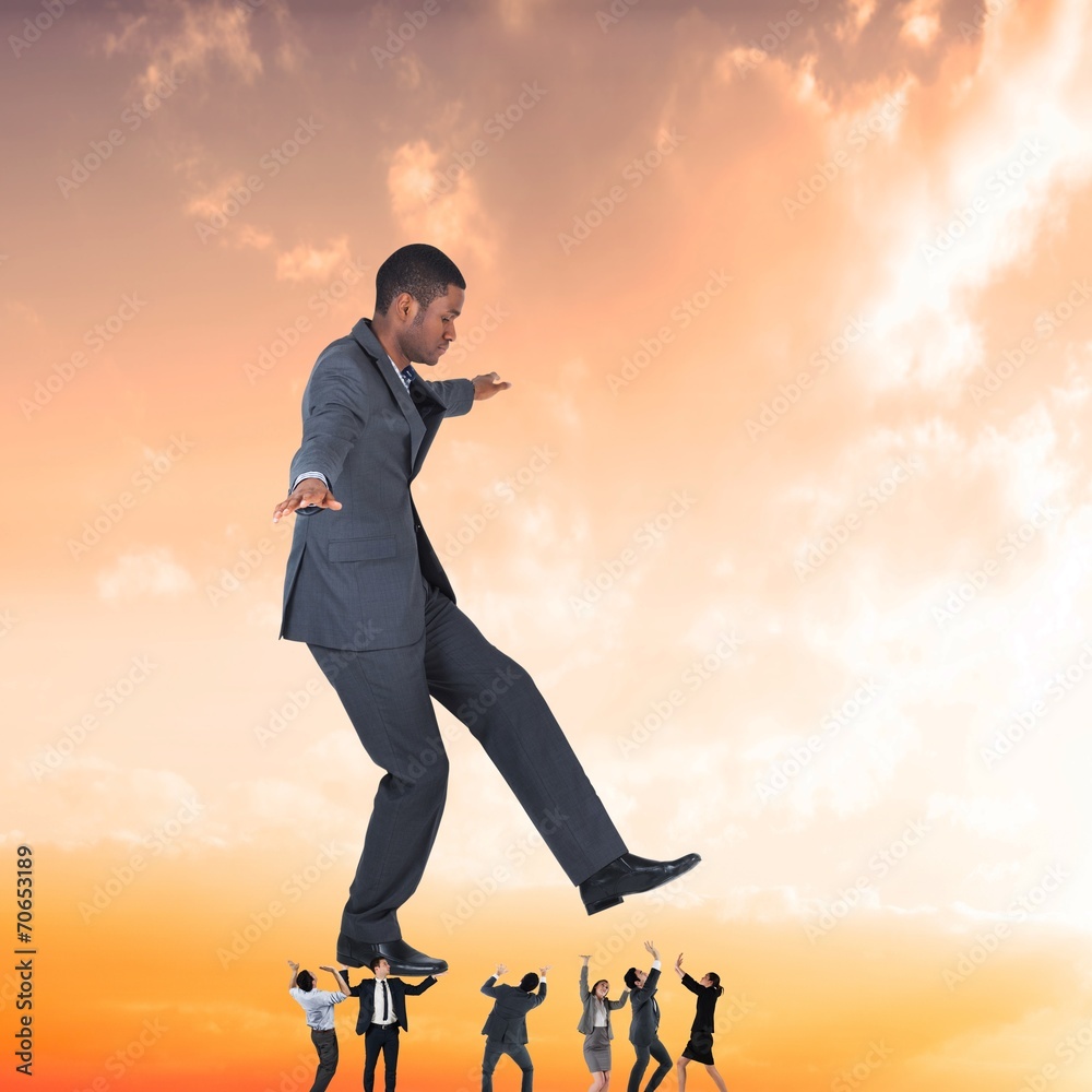 Poster composite image of business team supporting boss