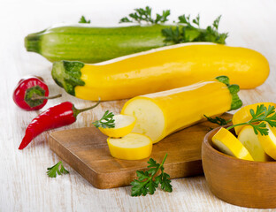Fresh zucchini on  wooden   background