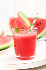 Watermelon cocktail on table, close-up