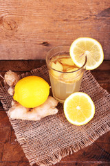 Ginger drink and ginger root and lemon