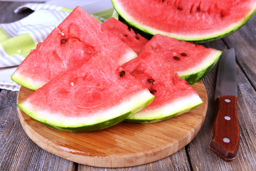 Slice of watermelon on wooden table