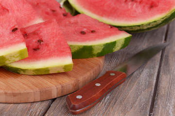 Slice of watermelon on wooden table