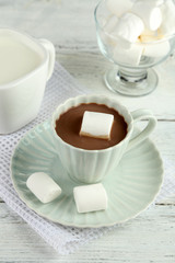 Hot chocolate with marshmallows in mug,