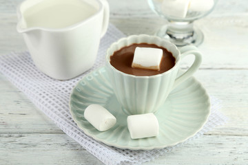 Hot chocolate with marshmallows in mug,