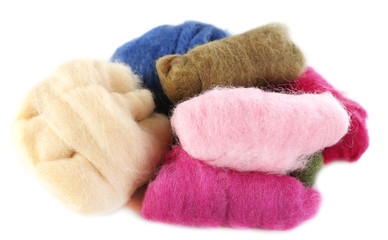 Fototapeta na wymiar Multicolored wool for felting isolated on white