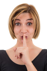 woman making silence sign with her finger