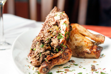 Fried chicken stuffed with giblets.