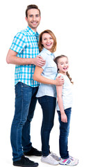 Full portrait of the happy european family with child