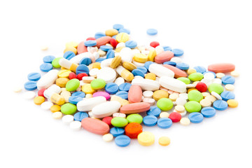 colorful pills isolated on white
