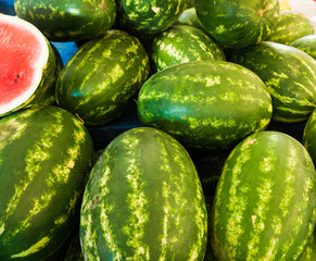 Watermelons on a market.  Heap of watermelons.