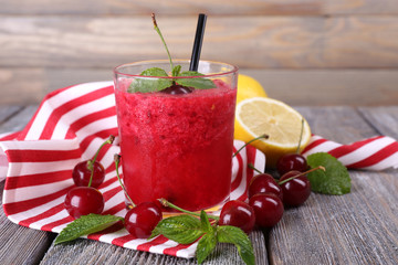 Fresh cold cherry cocktail with mint and lemon