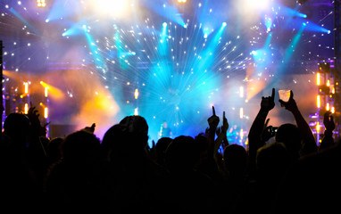Fototapeta na wymiar Crowd celebrating the New year with fireworks