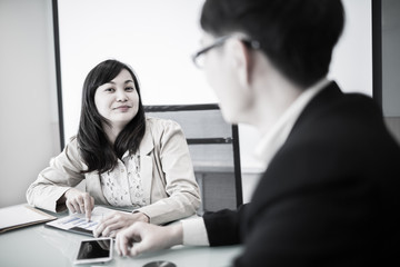 Successful young business executives meeting at the office