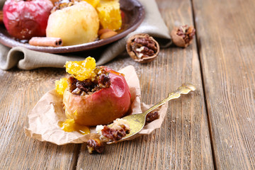 Baked apples on table close up