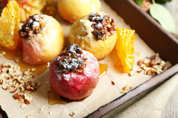 Baked apples on tray close up