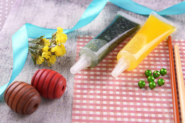 Scrapbooking craft materials on bright background