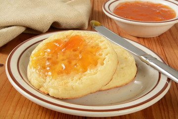 Crumpets with apricot jam