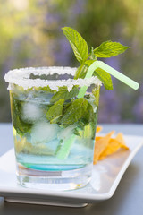 Fresh mojitos cocktail with nachos