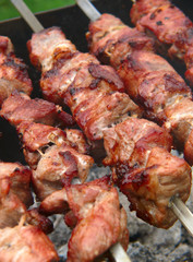 Fresh juicy shashlik on the grill. 