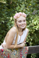 Obraz premium Beauty woman with a wreath on head