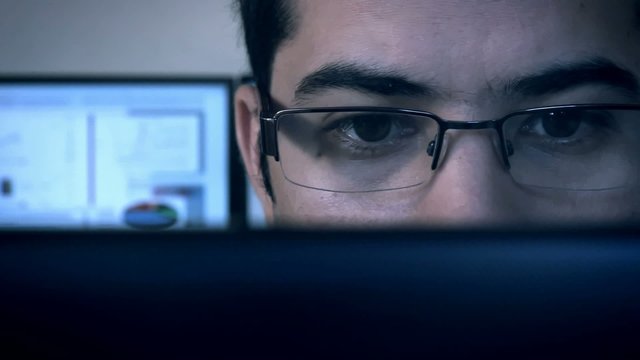 Close up of a young business man at the office 02